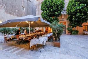 The outdoor terrace at Trattoria AD 1530 in Mdina.