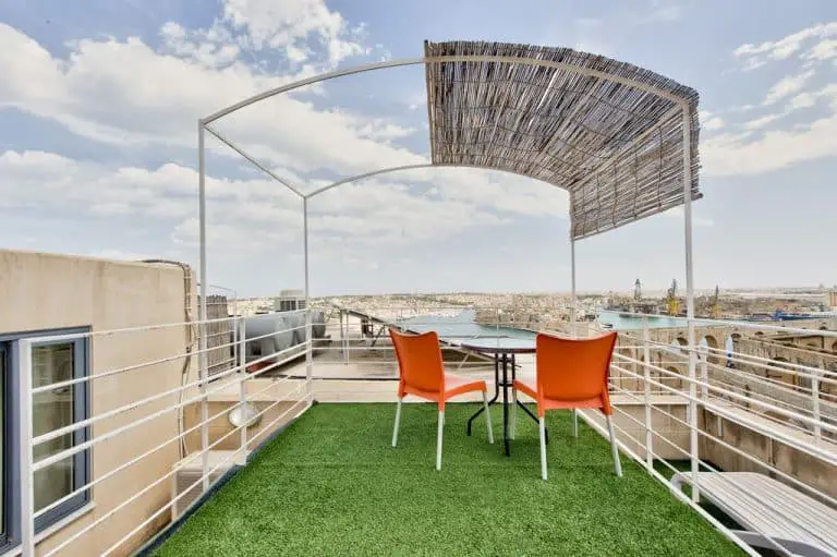 Outdoor terrace on the roof with harbour views at Barrakka Suites.