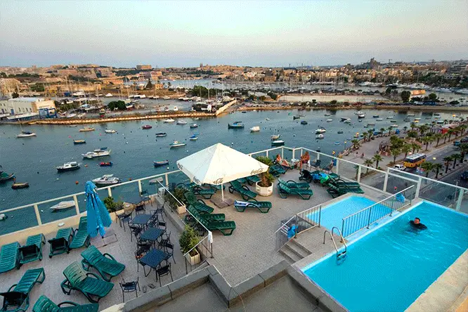 The Bayview Sliema Hotel and Apartments rooftop pool and sundeck.