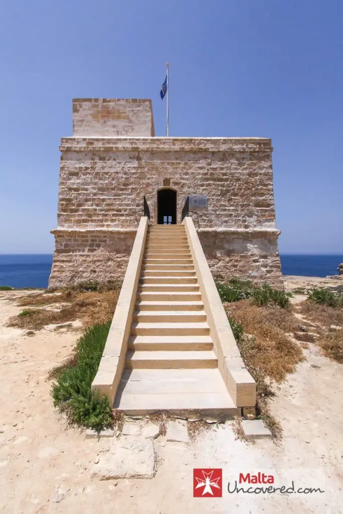 The Dwejra Watch Tower with its flag hoisted to indicate that it's open to visitors.