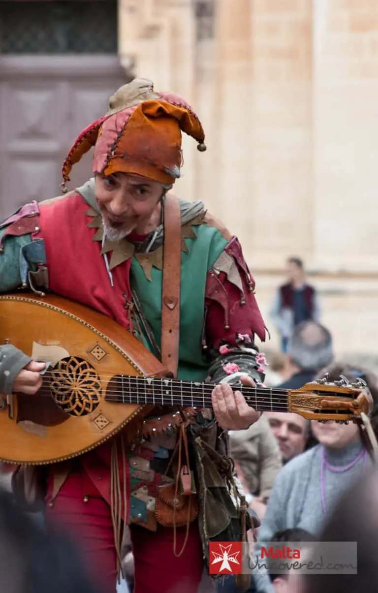 A scene from Malta's history: A jester entertains the crowd at Medieval Mdina.