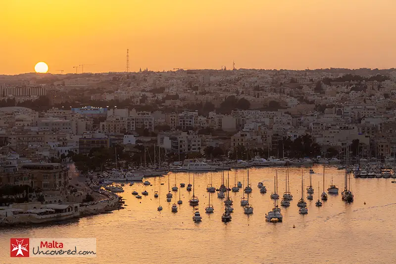 Manoel Yacht Marina in Valletta Harbour at sunset.