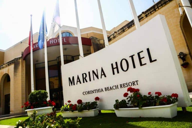 The entrance of the Marina Hotel Corinthia Beach Resort.