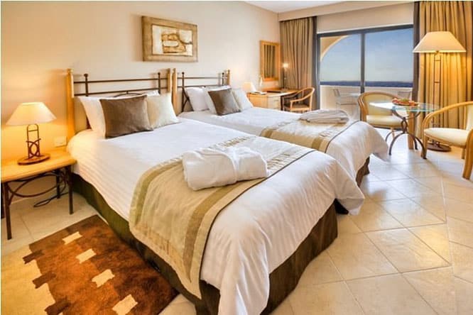 Guest room at the Marina Hotel Corinthia Beach Resort.