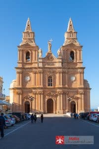 The Mellieħa church seen from its square.